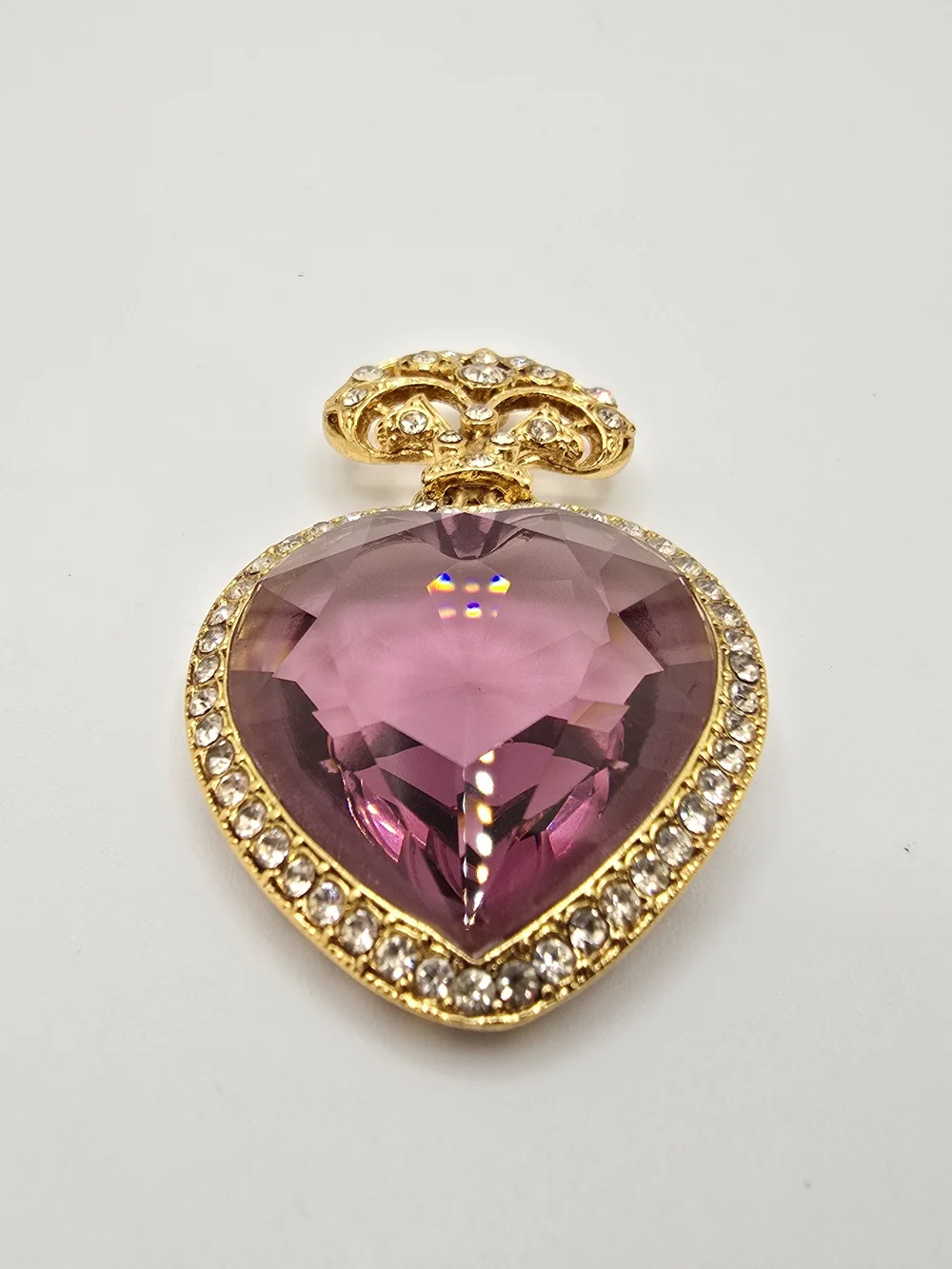 Vintage Purple Crystal Heart Brooch Rhinestone Gold Tone Articulated 2.25